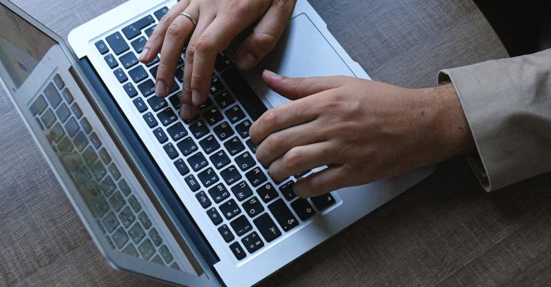 Corporate Social - Man working on laptop in office