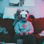 Virtual Reality Tours - Boy in virtual reality helmet playing joystick