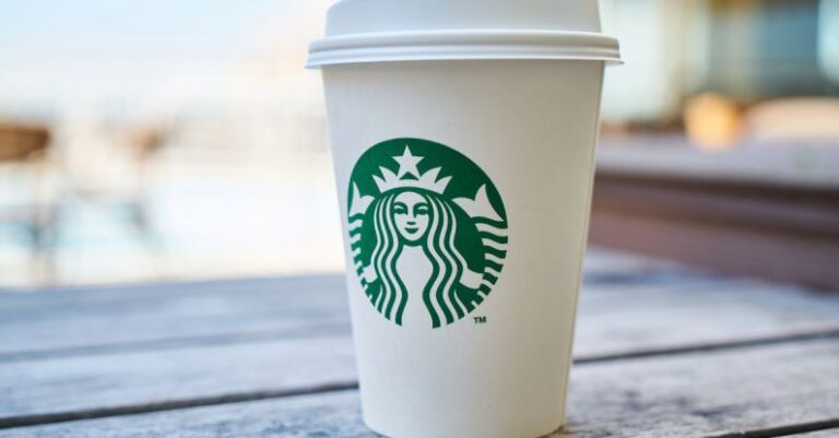 Franchises - Closed White and Green Starbucks Disposable Cup